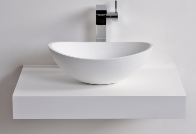 Mẫu lavabo bàn đá trắng nhân tạo tinh tế, sang trọng phù hợp với mọi không gian phòng tắm.